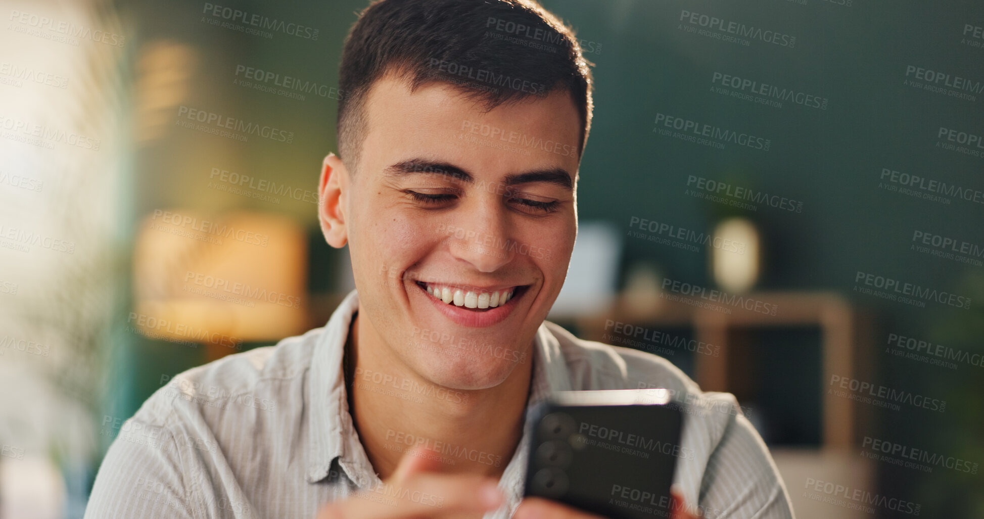 Buy stock photo Joke, smile and man with smartphone for online meme with social media, internet gif and reading crazy story in office. Male person, laugh and mobile website for streaming funny video or comedy film