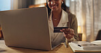 Woman, credit card and laptop at desk for e commerce, subscription and social media in home. Journalist, smile and technology with payment for internet, application and online for digital finance 