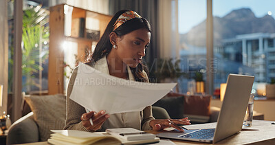 Buy stock photo Indian woman, home office and laptop with graphs on paper for financial reviews, calculation and report. Female accountant, remote work and finance adviser with statistics in auditing for business