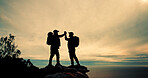 High five, silhouette and winner with friends on mountain peak together for fitness, hiking or view of ocean. Sky, success and support with hiker people in nature for exercise, hobby or vacation