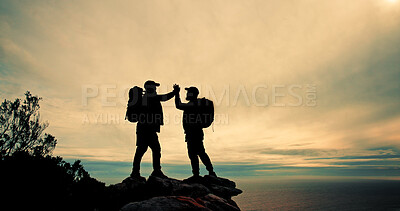 Buy stock photo High five, silhouette and winner with friends on mountain peak together for fitness, hiking or view of ocean. Sky, success and support with hiker people in nature for exercise, hobby or vacation