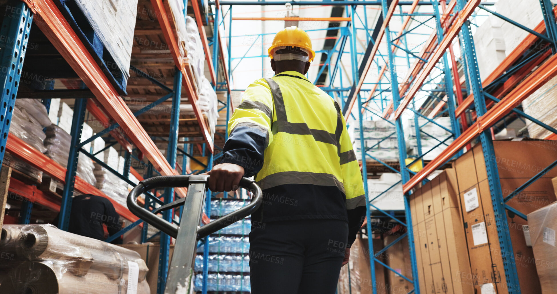 Buy stock photo Factory, man and worker pull pallet truck for supply chain, restock inventory or moving freight. Warehouse, engineer and trolley for cargo storage, distribution logistics or back in shipping industry