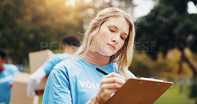 Buy stock photo Checklist, volunteer and woman in park planning schedule for sustainable green project at ngo. Clipboard, sign up and girl in nature with application for community service with social responsibility