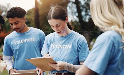 Buy stock photo Checklist, volunteer and group of people in park together planning for sustainable green project at ngo. Schedule, discussion and team in meeting, community care or sign up for social responsibility