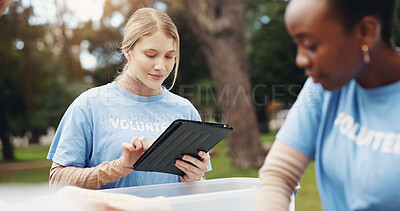 Buy stock photo Tablet, volunteer and people in park for checklist at charity event, community service and teamwork. Volunteering, ngo group and women on digital tech for social media, website and online inventory