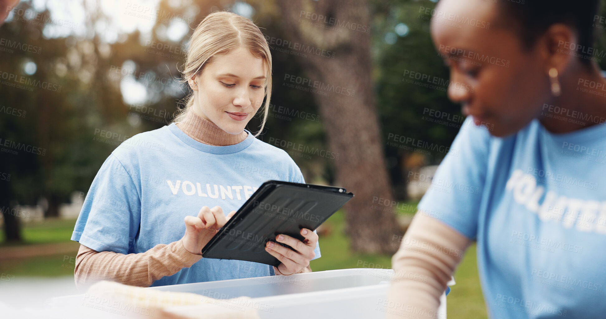 Buy stock photo Tablet, volunteer and people in park for checklist at charity event, community service and teamwork. Volunteering, ngo group and women on digital tech for social media, website and online inventory