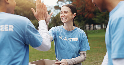 Buy stock photo High five, volunteer and people in park for charity event, community service and teamwork. Food drive, happy and men and women excited, cheering and celebrate for donation, ngo and outreach goals