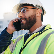 Phone call, planning and construction engineer on site with ...