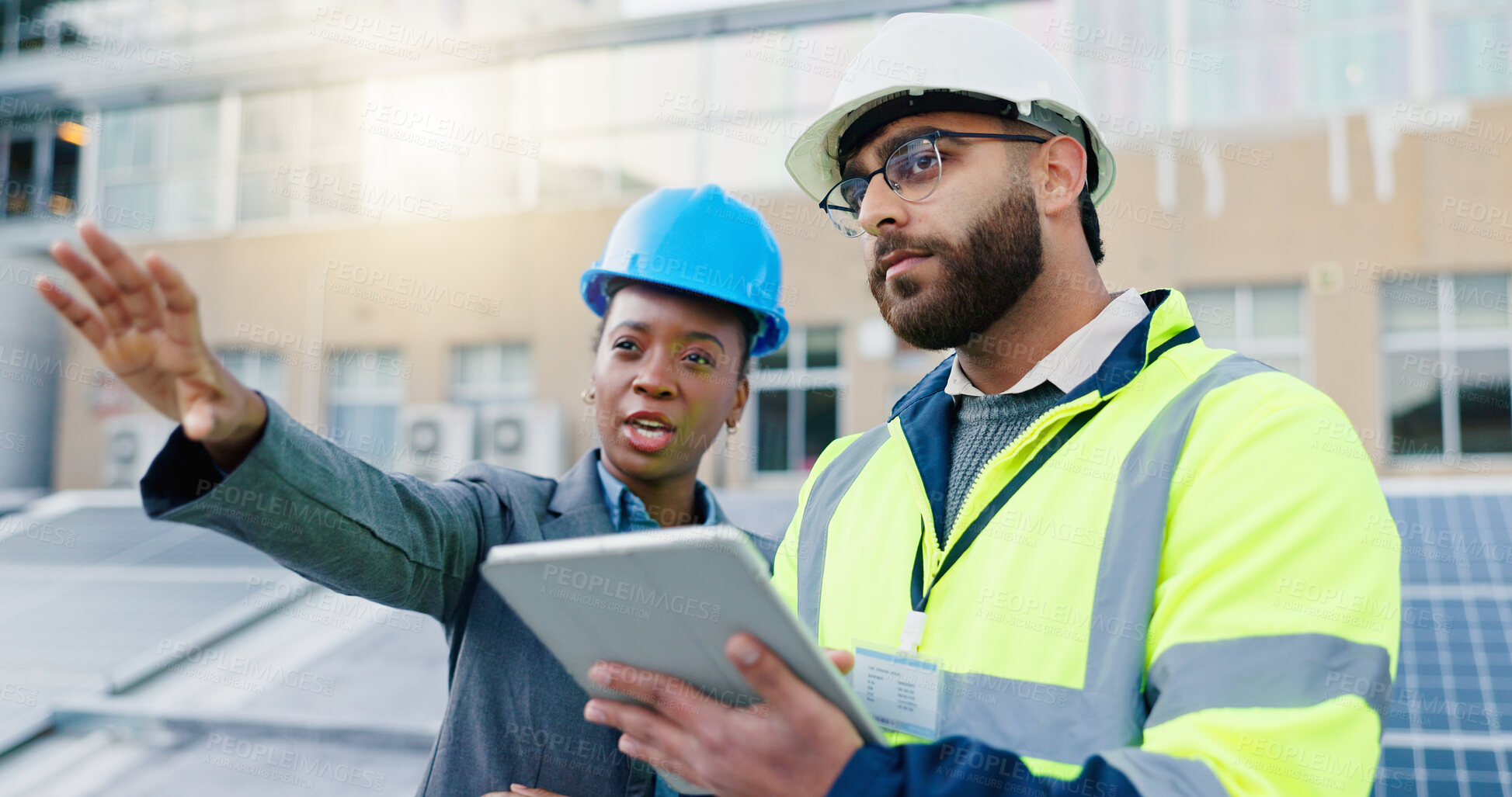 Buy stock photo Tablet, engineering and construction team on rooftop site for city planning, renovation or building project. Digital technology, architecture and industrial employees with maintenance check in town.