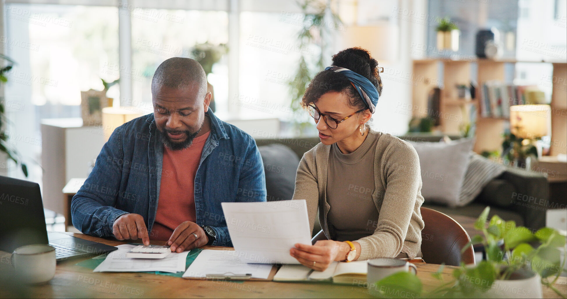 Buy stock photo Financial paperwork, counting or African couple with planning or household budget in home. Bills, calculator or people with form documents for accounting report of investment growth, taxes or salary