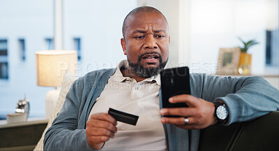 Buy stock photo Credit card, scam or black man with phone on website notification in home with stress or crisis. Fear, victim and upset person frustrated by mobile app, hacked pension fund or reading news in Nigeria