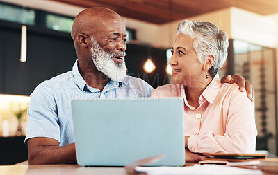 Buy stock photo Senior couple, talk and hug by laptop for search, booking or discount for international travel in retirement. Mature interracial people, man and woman by pc, documents or planning for holiday in home