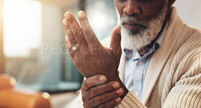 Buy stock photo Home, hands and senior black man with wrist pain for injury, inflammation and discomfort of carpal tunnel. House, male person and ache with massage for relief, osteoporosis and arthritis symptoms