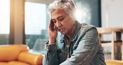 Buy stock photo Home, sofa and senior woman with headache for stress, muscle tension or emergency for hypertension. House, female person or pain with migraine for dementia, temple massage or discomfort in retirement