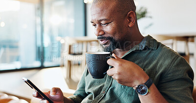 Buy stock photo Mature black man, phone and coffee in home with thinking, smile and reading email notification in morning. Person, smartphone and happy with tea, news and scroll on social media with mobile app