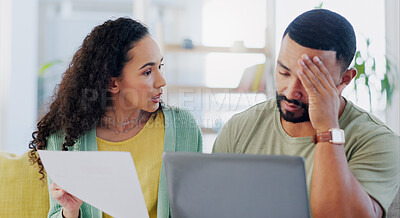 Buy stock photo Frustrated couple, headache and stress with laptop for expenses, bills or financial crisis on sofa at home. Young man, woman or fight with finance, paperwork or invoices for debt or mortgage at house