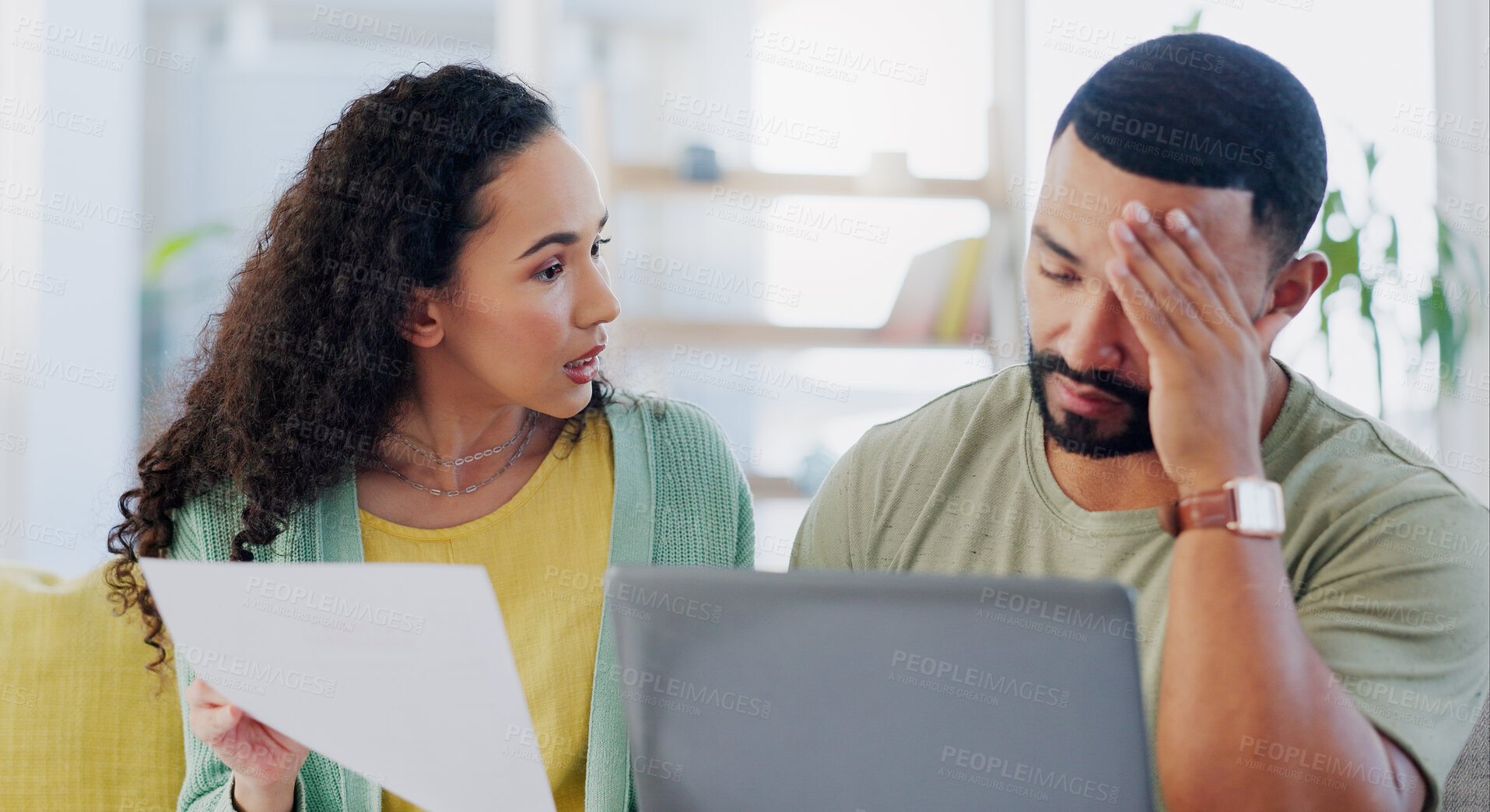 Buy stock photo Frustrated couple, headache and stress with laptop for expenses, bills or financial crisis on sofa at home. Young man, woman or fight with finance, paperwork or invoices for debt or mortgage at house