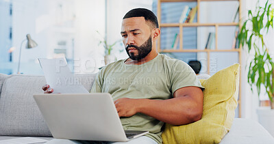 Buy stock photo Remote work, laptop and man on sofa with documents for budget report, research and internet for freelance job. Paperwork, home and person on computer for website, online banking or financial planning