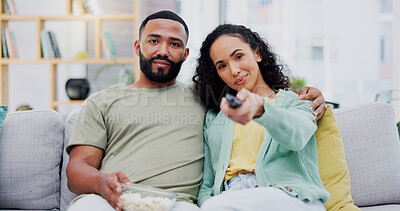 Buy stock photo Couple, portrait and remote for watching film in home, streaming online and switch channel on sofa. People, relax and popcorn for romance movie in living room, Brazil and hug for subscription series