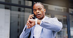 Black man, time and watch with phone call for deadline, business schedule or communication in city. Young African, businessman or employee checking wristwatch with mobile smartphone for discussion