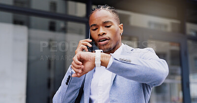 Buy stock photo Black man, time and watch with phone call for deadline, business schedule or communication in city. Young African, businessman or employee checking wristwatch with mobile smartphone for discussion