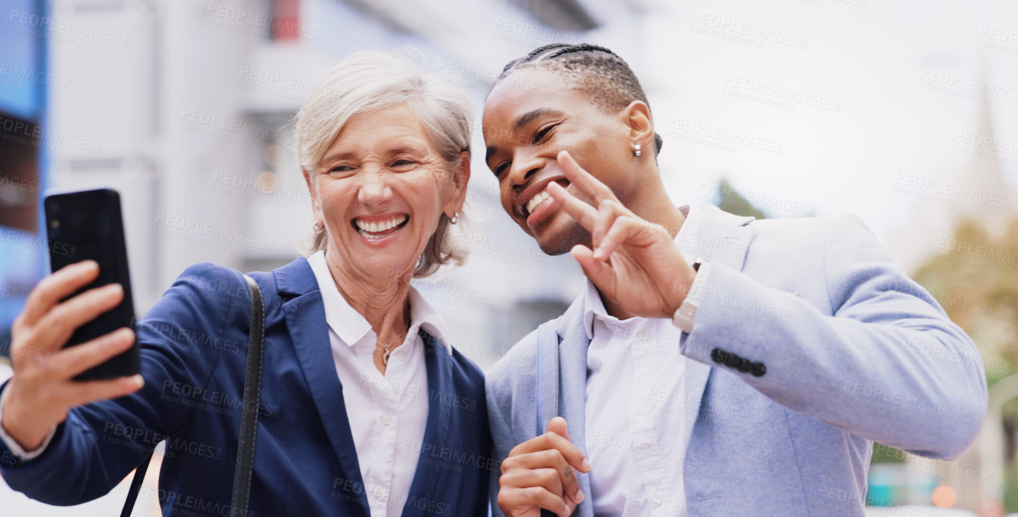 Buy stock photo Happy, business people and selfie with peace sign for photography, picture or outdoor memory together. Interracial, businessman and woman with smile or emoji for fun moment or social in an urban town