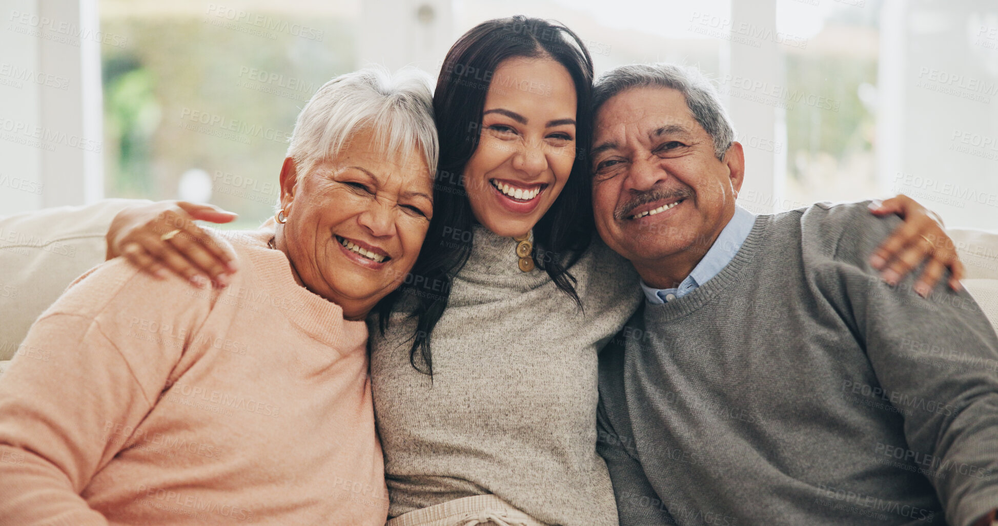 Buy stock photo Hug, portrait and smile of old people with daughter on sofa in living room of home for bonding or visit. Family, love and support with happy family embracing in apartment together for wellness