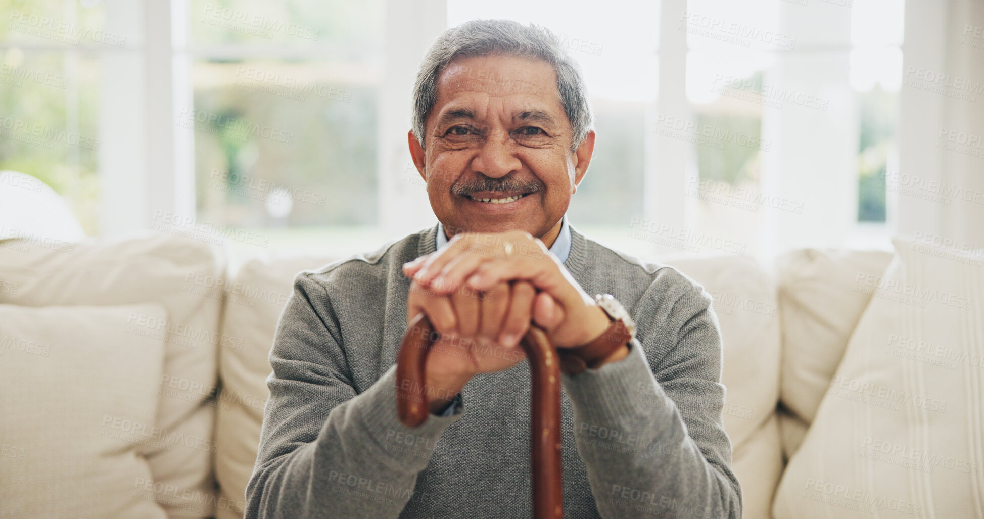 Buy stock photo Portrait, senior man and walking stick for Arthritis in elderly care, wellness or health. Happy pensioner, person with a disability and cane for support, balance or movement in retirement home in UAE