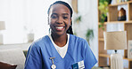 Portrait, black woman and smile as caregiver at house for healthcare service, career pride and about us. Happy, volunteer and professional medic with experience, medical support and retirement health