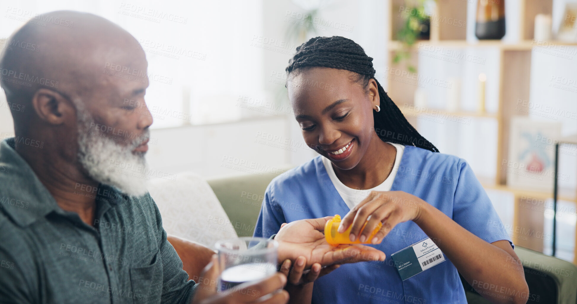 Buy stock photo Smile, pills and senior man with nurse, healthcare and caregiver with medicine and nursing home. Living room, medical and happy black people in house, rehabilitation and recovery of patient with help