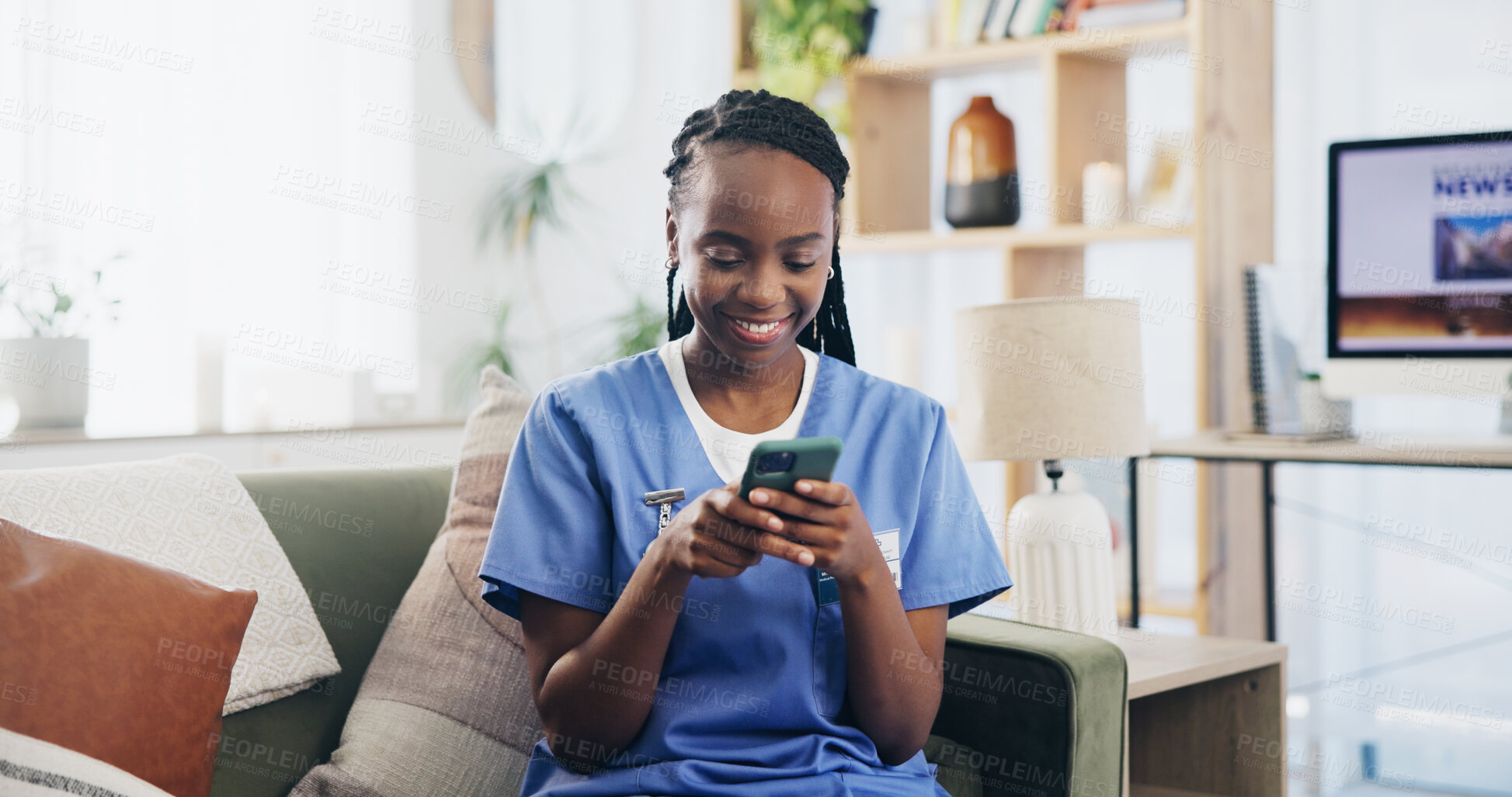 Buy stock photo Black woman, nurse or phone on sofa for text, email or message for news update in home. Caregiver, mobile or smile in living room for healthcare information, chat or happy for medical breakthrough