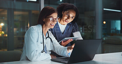 Buy stock photo Night, doctor and nurse on laptop for good news or reading online reading schedule in hospital on digital app. Medical results, overtime or happy woman with technology, website info or telehealth