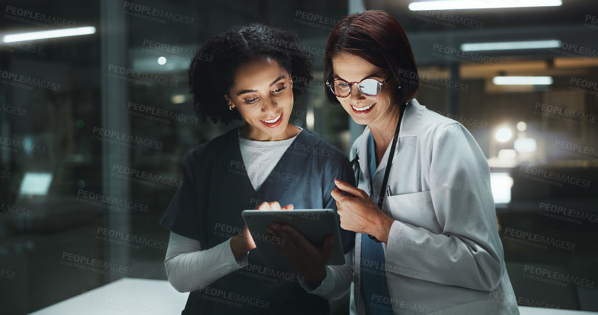 Buy stock photo Night, doctor and happy surgeon on tablet for reading online for good news and late schedule in hospital. Medical results, overtime and women with technology, clinic website or telehealth digital app