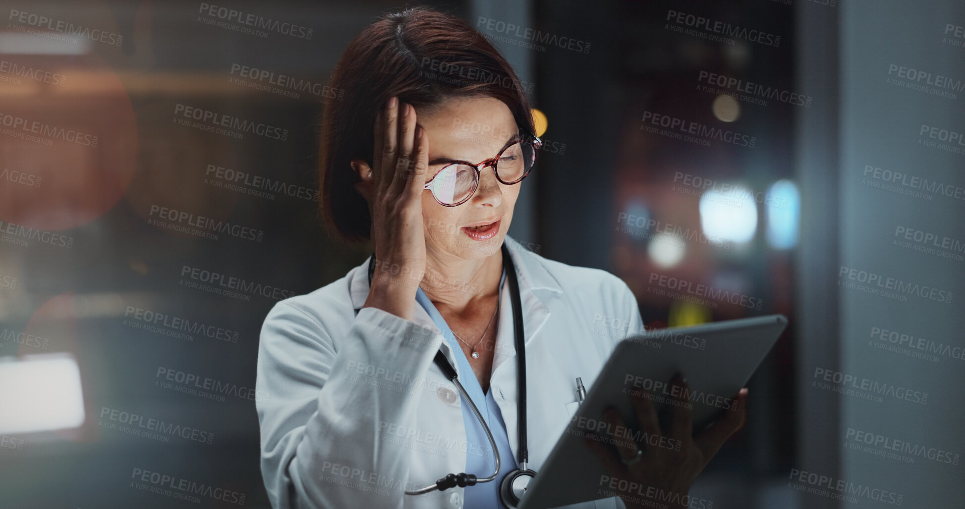 Buy stock photo Night, woman and doctor with tablet, headache and online reading for schedule, hospital and digital app. Migraine, medical or professional with tech, evening and mistake with burnout, fail or crisis