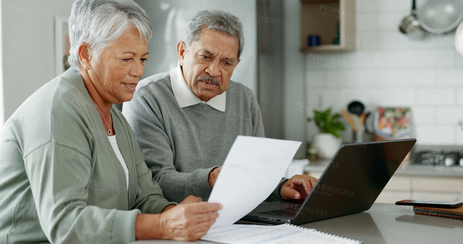 Buy stock photo Senior couple, paperwork and laptop for finance, taxes and review with pension, budget and reading in home. Elderly women, man and documents with computer, thinking and info for income in retirement