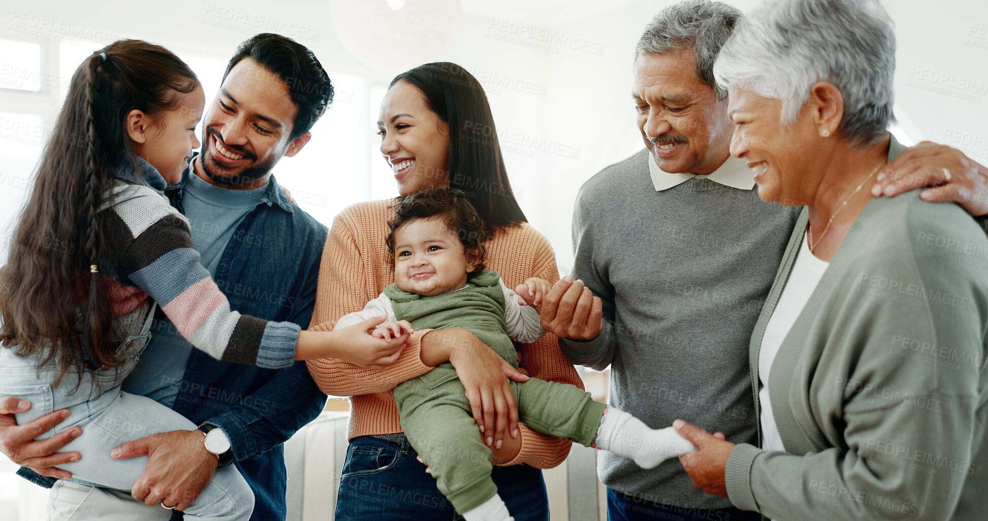 Buy stock photo Big family, smile and support with love in home for weekend visit, bonding together and generations. Happy people, parents and grandparents with kids for fun holiday, relax and quality time in house