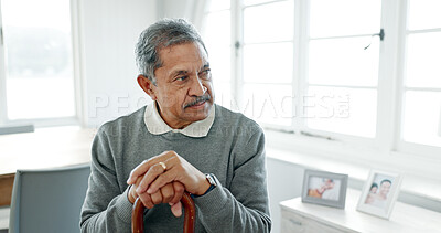 Buy stock photo Senior man, home and thinking with walking stick, wedding ring and grief in morning with memory of partner. Reflection, retirement and elderly person with disability, cane and remember in apartment