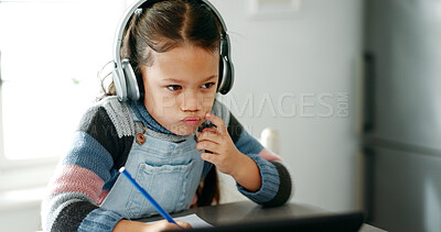 Buy stock photo Kitchen, child and thinking with laptop for education, elearning and connection for online class. Girl, studying and cognitive development with solution for homework, knowledge and headphones at home