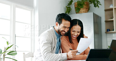 Buy stock photo Kitchen, couple and happy with document for finance, track expenses and success for budget goals. Laptop, man and and woman with tax review for checking, handle savings and mortgage paperwork at home