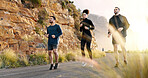 Exercise, running and training with friends in mountains together for cardio challenge or performance. Fitness, sports or workout with athlete men and woman on asphalt road in nature for improvement