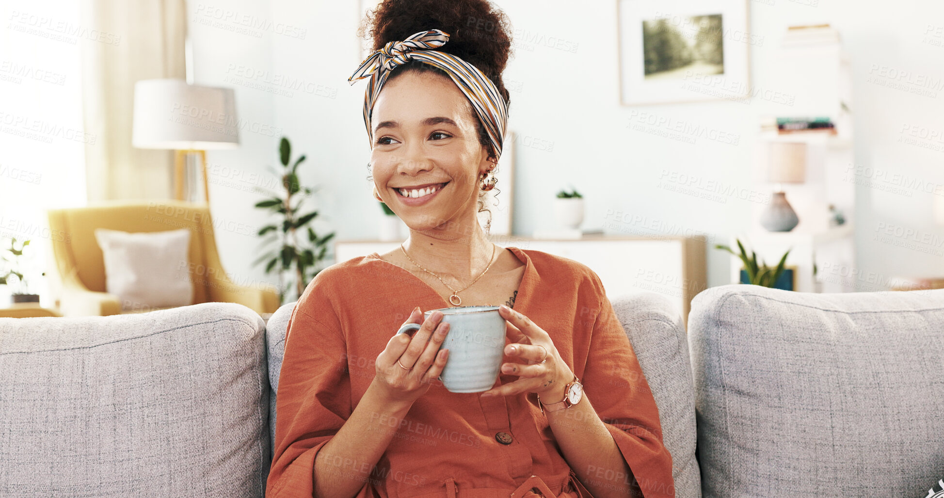 Buy stock photo Woman, smile and coffee on sofa with thinking, reflection and start morning in apartment. Girl, person and tea cup with memory, insight and drink with nostalgia on living room couch at modern house