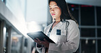 Woman, doctor and night with tablet for research, medical data or new discovery at hospital. Young, female person or healthcare employee working late on technology for medicinal information at clinic