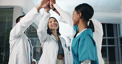 Buy stock photo Healthcare, team and high five in hospital for success, medical breakthrough and excited for achievement. Doctors, nurses and celebration in lobby for job excellence, collaboration and announcement