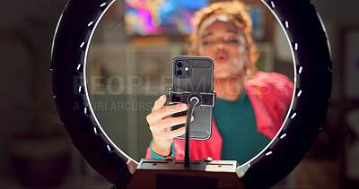 Buy stock photo Happy woman, influencer and phone with ring light for content creation, video recording or online tutorial at home. Young, female person or vlogger on mobile smartphone for kiss, like and subscribe