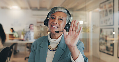 Buy stock photo Woman, video call and portrait for wave, headset or happy for communication, contact us and tech support. Mature person, agent and webinar with palm, hello and smile for customer service in office