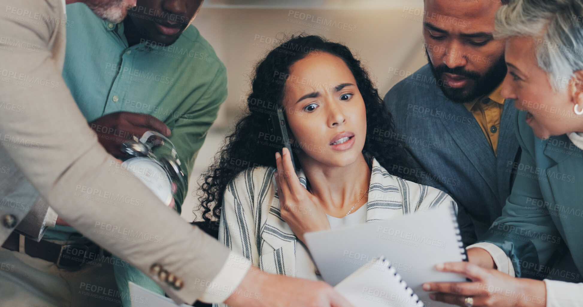 Buy stock photo Frustrated, business woman and phone call with overload or demanding team in chaos at office. Female person, employees or group with documents in stress, anxiety or overwhelming pressure at workplace