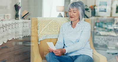 Buy stock photo Elderly woman, thinking and picture memory in retirement home with nostalgia, peace and calm. Senior lady, relax and thoughtful in living room with gratitude, mindfulness and idea on lounge couch