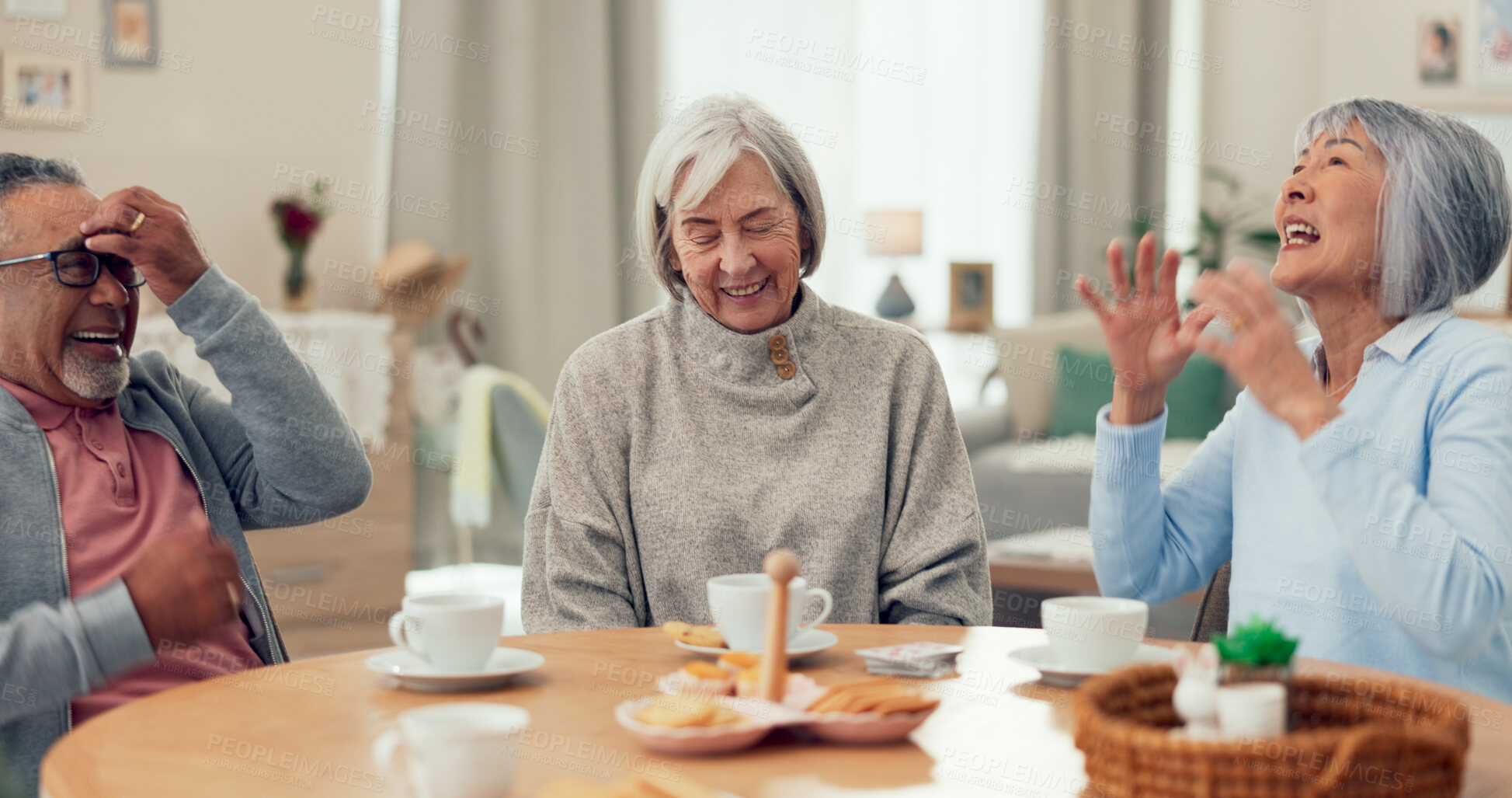 Buy stock photo Joke, tea and senior friends at table for funny conversation, snacks and retirement together in house. Happy group, party and man speaking with elderly women for breakfast, communication and bonding