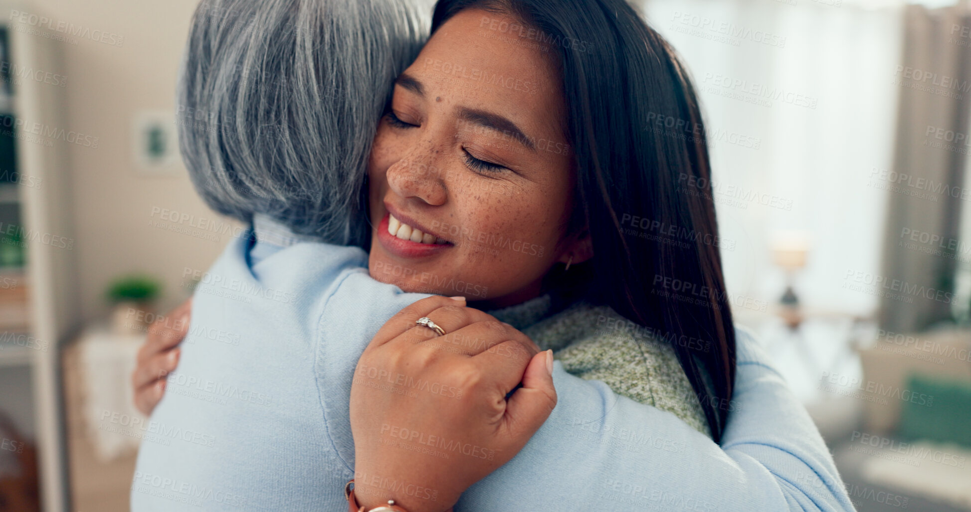 Buy stock photo Home, hug and mama with adult daughter, happiness and kindness in living room. Apartment, mother and girl in lounge, embrace and bonding together with comfort, smile and support with family or parent