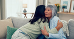 Love, hug and mother with adult daughter, happiness and bonding together in living room. Apartment, mama and girl in lounge, embrace and parent with comfort, home and support with family and empathy